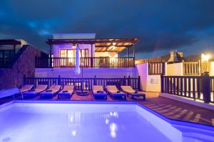 big-playa-blanca-villa-vista-rey-private-heated-pool-night